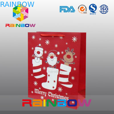 El rojo modificó el bolso del regalo para requisitos particulares de la Navidad de las bolsas de papel con la cuerda roja/lindo impreso