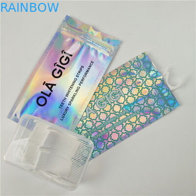 Empaquetado modificado para requisitos particulares claro brillante del bolso de la cerradura de la cremallera del papel de aluminio de las bolsas de plástico del agujero de la caída de la seda dental del frente