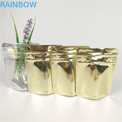 Las galletas olográficas brillantes de aluminio que empaquetan los bolsos 3.5g 7g se colocan encima de bolsas