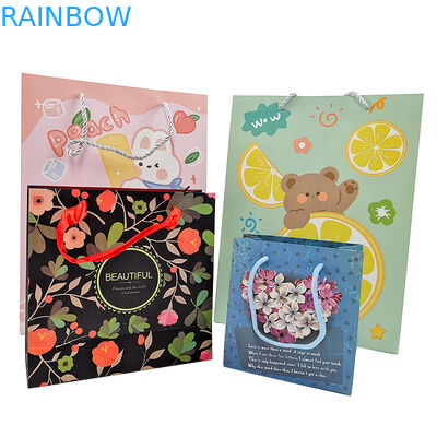 Venta al por mayor de bolsas de papel de regalo de lujo con logotipo impreso a medida Venta al por menor de bolsas de papel de compras