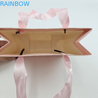 Aseguramiento de calidad Bolsas de papel personalizadas para compras con impresión de logotipo Bolsas de papel biodegradables