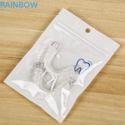 Bolsas Mylar con cerradura de cremallera plana personalizada Con retenedores de cremallera transparentes de un lado para dientes falsos Bolsa de embalaje con alineador claro