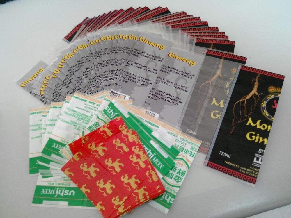 Etiquetas de la manga del encogimiento del uso de la mano para el empaquetado de la botella de agua del coco