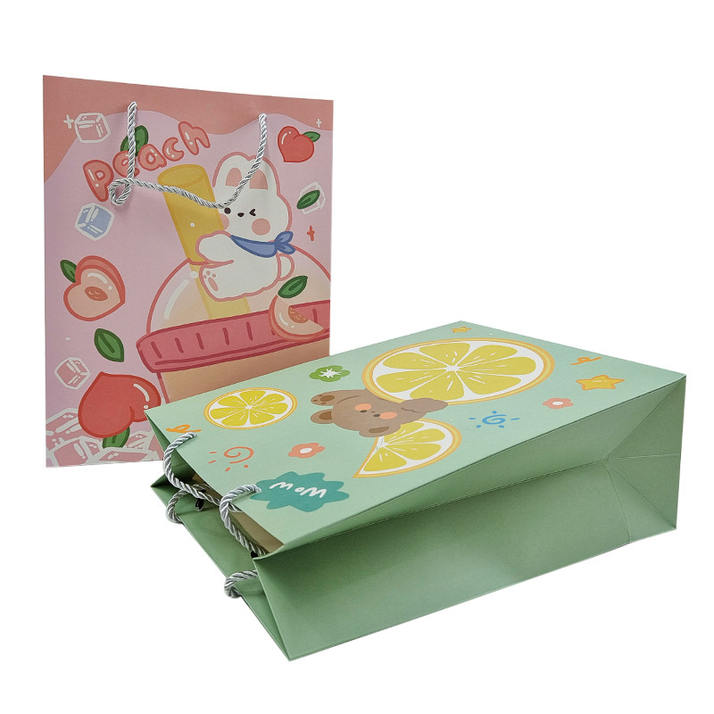 Venta al por mayor de bolsas de papel de regalo de lujo con logotipo impreso a medida Venta al por menor de bolsas de papel de compras