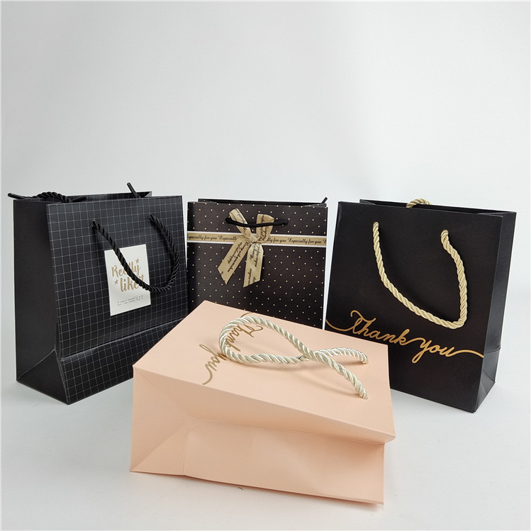 Impresión digital personalizada de alta calidad Logotipo Impreso Bolsa de papel para compras Embalaje Blanco 110 gramos Reutilizable