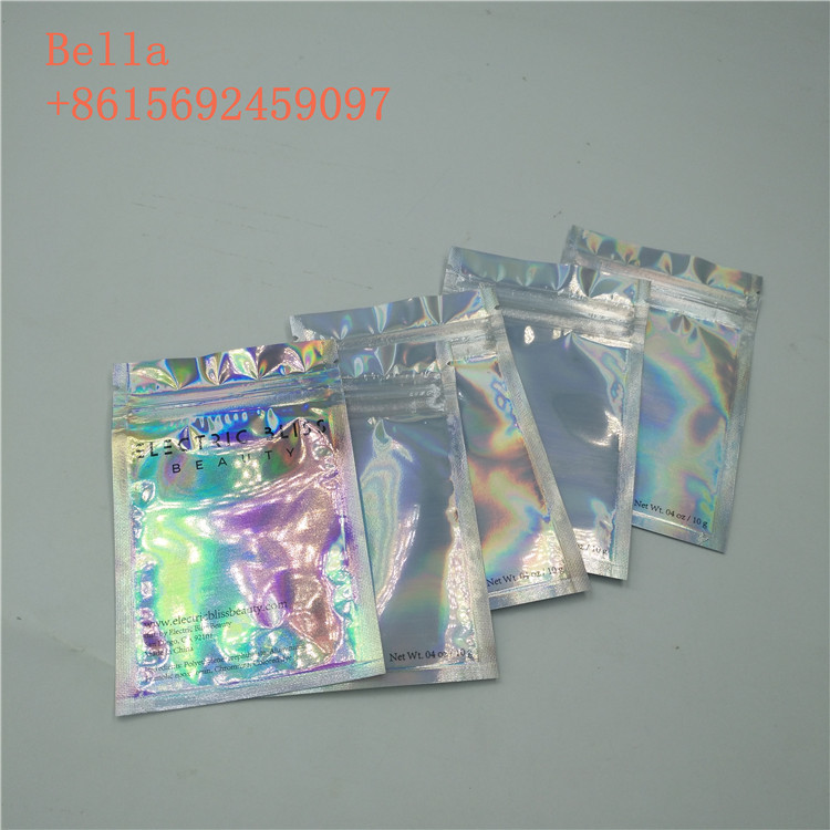 La bolsa lateral de la hoja del sello tres que empaqueta, pequeño cosmético se levanta bolsos con la cremallera