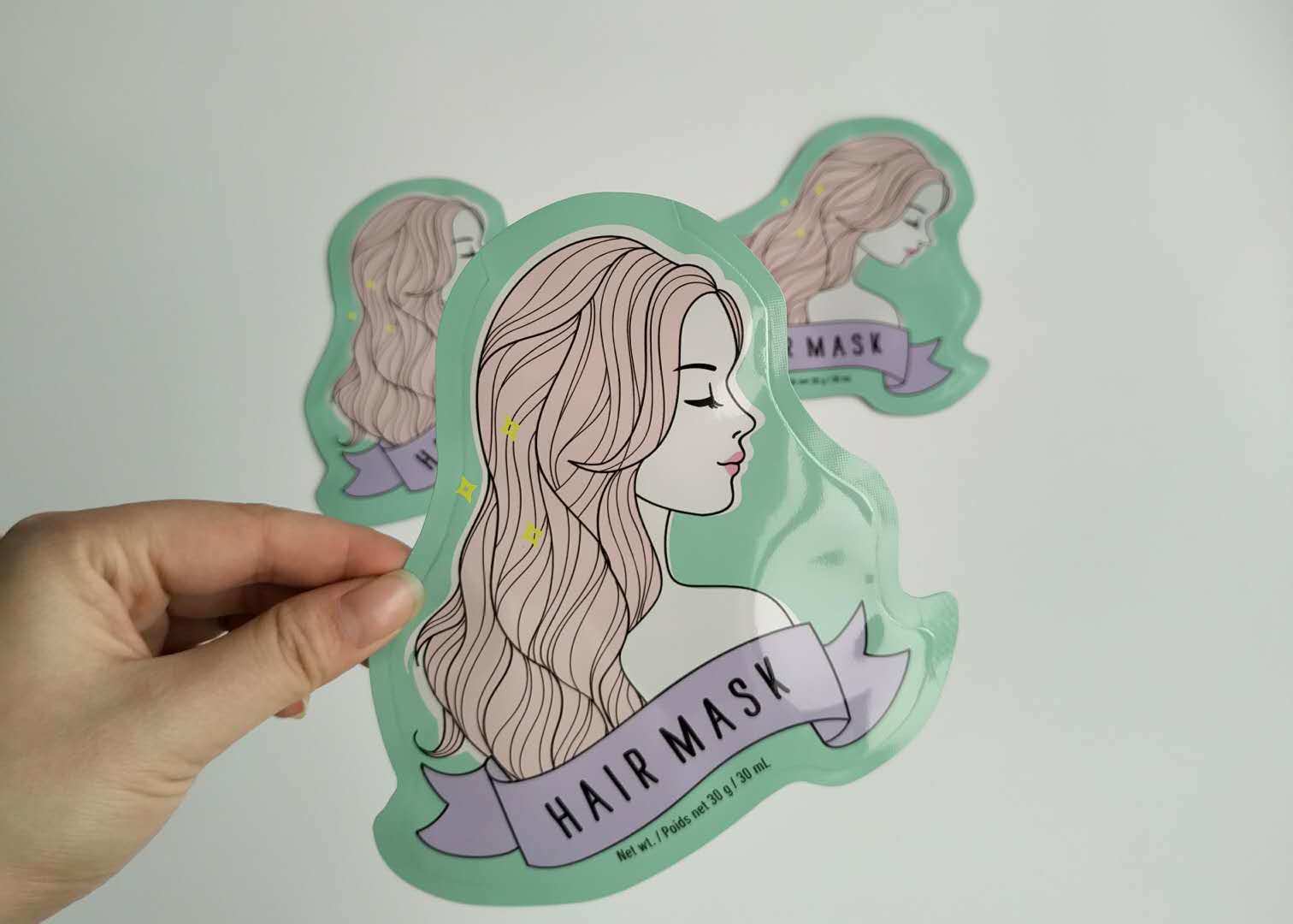 Empaquetado facial de la máscara de la hoja de la forma de aluminio del papel del lado del escudete de los bolsos plásticos especiales del cosmético