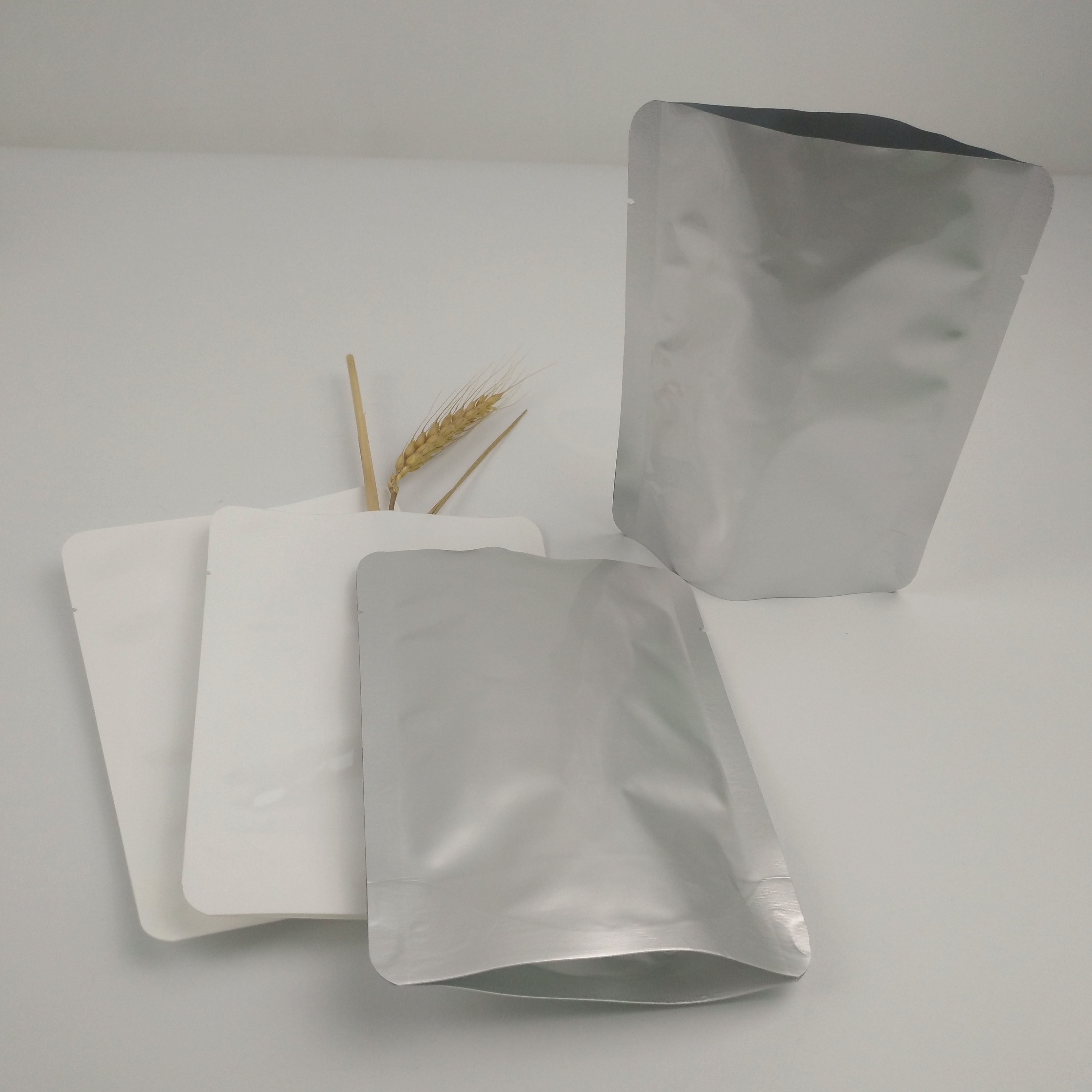 Bolso plástico del sellado al vacío del acondicionamiento de los alimentos de aluminio de la categoría alimenticia del papel del olor de la prueba del bolso del bolso derecho al por mayor de encargo de la bolsa