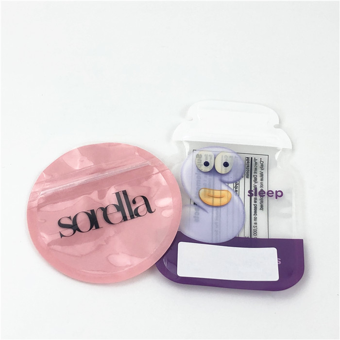 CMYK cortó los bolsos MOPP 100mic de la lámina de mylar con tintas brillantes para el caramelo de Gummies comestible