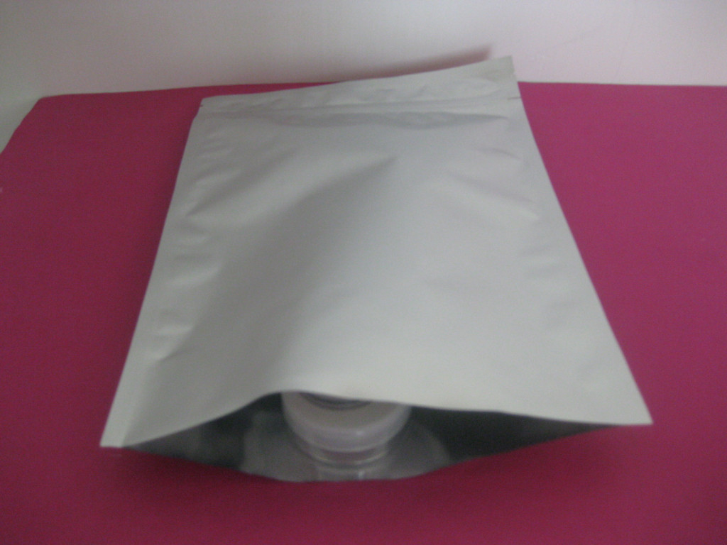 Coloque la hoja para arriba metalizada se levantan las bolsas a prueba de humedad para las galletas